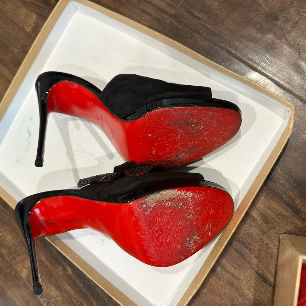 Christian Louboutin Black Heels with Signature Red Soles